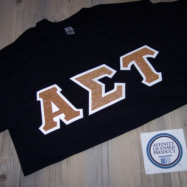 Alpha Sigma Tau Shirt -- Old Gold Glitter on White Twill