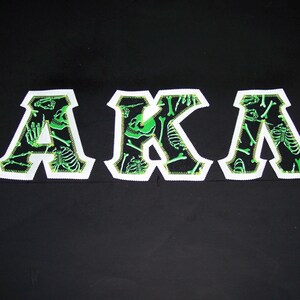 Alpha Kappa Lambda Shirt - Skeletons (Glow in the Dark) on White Twill