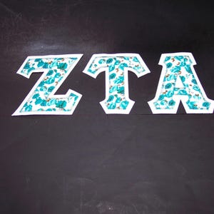 Zeta Tau Alpha Shirt -- Abstract Teal Roses on White Twill