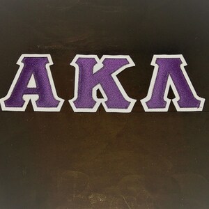 Alpha Kappa Lambda Shirt -- Purple Twill on White Twill