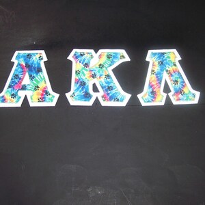 Alpha Kappa Lambda Shirt -- Paw Prints & Tie Dye on White Twill