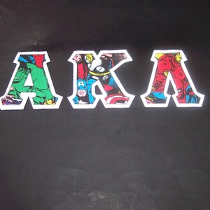Alpha Kappa Lambda Shirt -- Action Figures on White Twill
