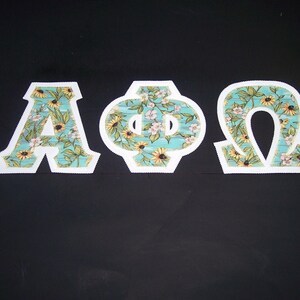 Alpha Phi Omega Shirt -- Black Eye Susans on White Twill