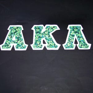 Alpha Kappa Lambda Shirt -- Shamrocks on White Twill