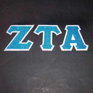 Zeta Tau Alpha Shirt -- Turquoise Glitter on Gray Twill
