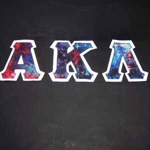 Alpha Kappa Lambda Shirt - Patriotic Galaxy  on White Twill
