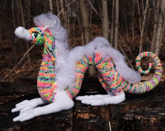 Glory - UV-reactive rainbow Eastern Dragon, crochet sculpture with safety eyes and resin horns