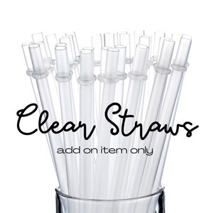 May include: A bunch of clear plastic drinking straws in a glass. The text "Clear Straws add on item only" is printed below the straws.