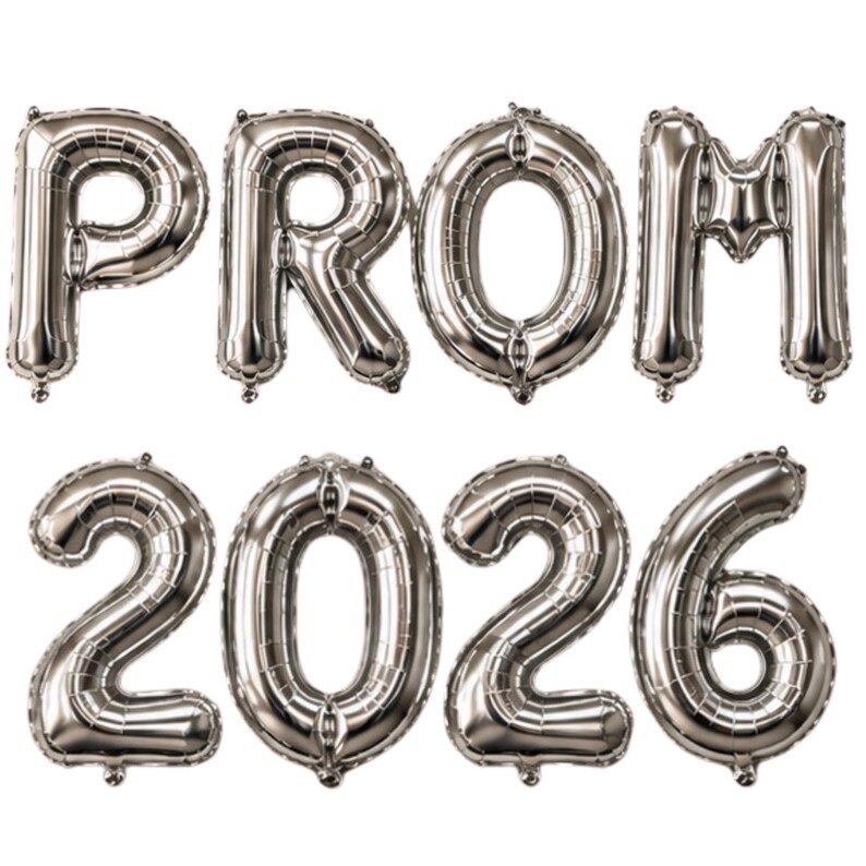 May include: Silver foil balloons spelling out "PROM 2026". The balloons are inflated and arranged in two rows, with "PROM" on top and "2026" below. The balloons are metallic and reflective.