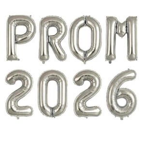 May include: Silver foil balloons spelling out "PROM 2026". The balloons are inflated and arranged in two rows. The top row spells "PROM", and the bottom row spells "2026". The balloons are metallic and reflective.