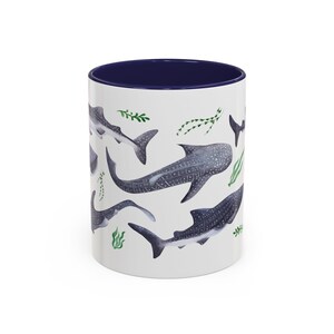 Watercolor whales sharks swimming with seaweed around covering all around the mug