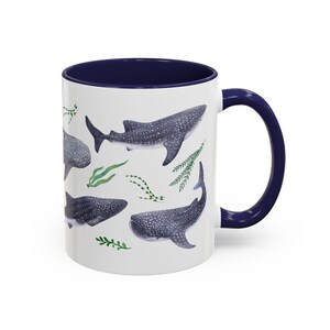 Watercolor whales sharks swimming with seaweed around covering all around the mug
