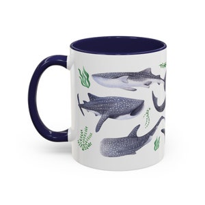 Watercolor whales sharks swimming with seaweed around covering all around the mug