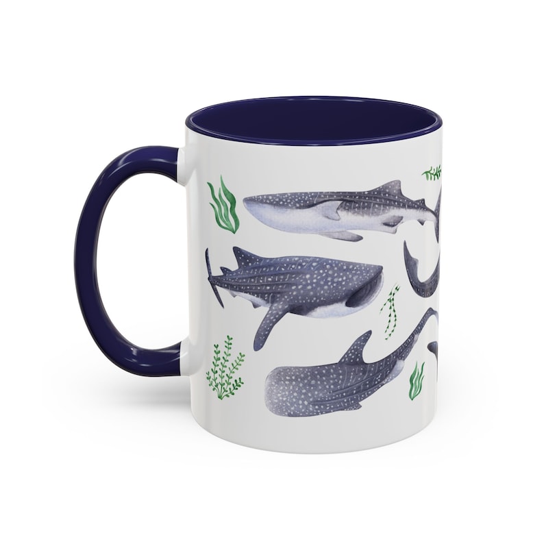 Watercolor whales sharks swimming with seaweed around covering all around the mug