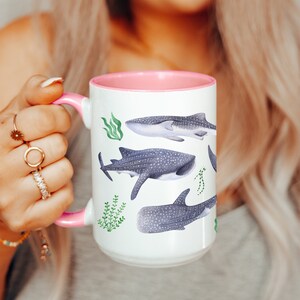 Watercolor whales sharks swimming with seaweed around covering all around the mug