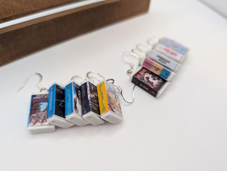 a couple of books are hanging from a hook