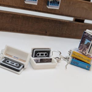 a couple of key chains sitting on top of a table