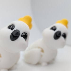Cute articulated cockatoo