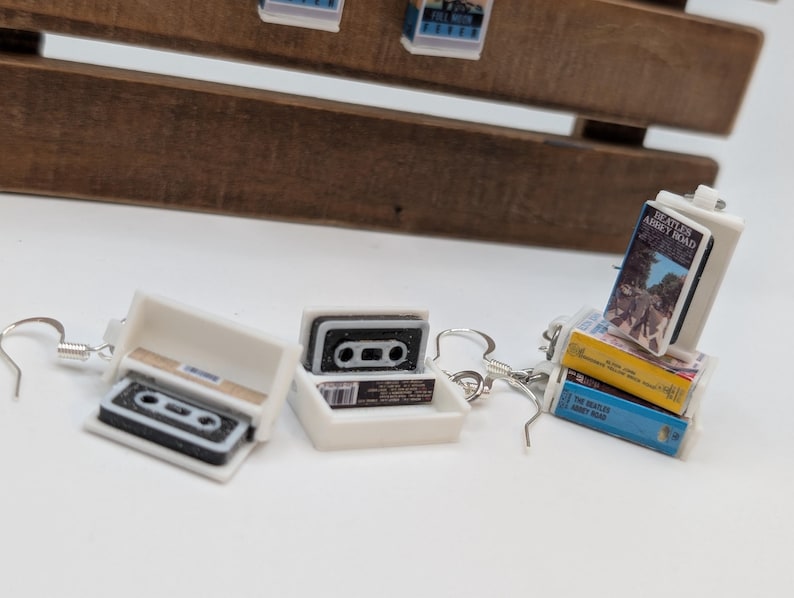 a couple of key chains sitting on top of a table