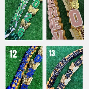 May include: Four graduation leis with names and the year 2026, 2020, and 2022. The leis are in various colors, including green, pink, blue, and black, with gold butterfly accents and bows.