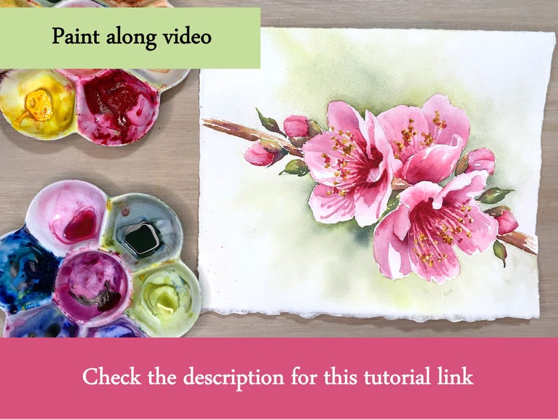 K&ouml;nnte beinhalten: Aquarellmalerei von rosa Kirschbl&uuml;ten auf einem Ast, mit gr&uuml;nen Bl&auml;ttern und Knospen. Das Gem&auml;lde befindet sich auf strukturiertem Papier. Zwei Farbpaletten mit verschiedenen Farben befinden sich im Bild. Der Text lautet "Paint along video" und "Check the description for this tutorial link."