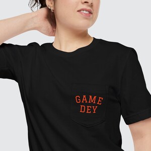 GAME DEY | Unisex Pocket Tee In Burrow We Trust