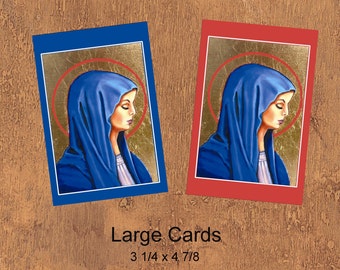 May include: Two large greeting cards with a religious image of a woman in a blue robe with a gold halo. The cards are 3 1/4 x 4 7/8 inches and have a blue and red border.