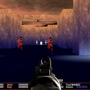 May include: A first-person shooter video game screen showing a player aiming a gun at two red-clad opponents in a futuristic, gray and blue environment. The player's health, ammo, and other game statistics are displayed at the bottom of the screen.