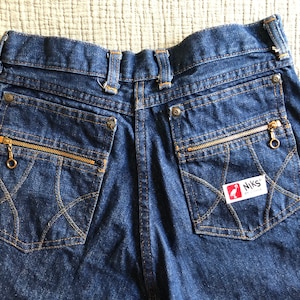 Vintage high waist jeans // Niks by Crane // 26&quot; waist // Raw Hem // straight leg