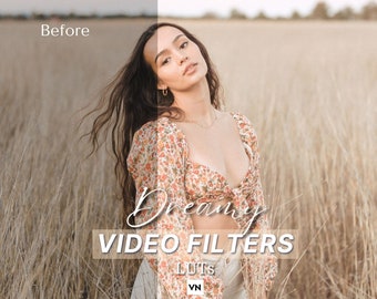 May include: A woman in a floral print top stands in a field of tall grass. The text "Dreamy Video Filters LUTS VN" is superimposed on the image.
