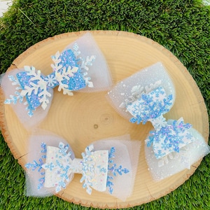 Frozen inspired princess tulle hair bow, glitter tulle snowflake toddler girl clip, birthday statement snowflake hair bow for girls