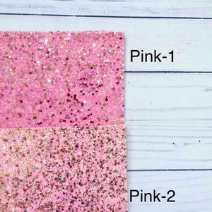 May include: Two pink glitter sheets, one with a fine glitter and the other with a larger glitter. The sheets are labeled "Pink-1" and "Pink-2".