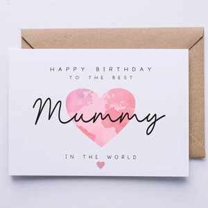 May include: A white card with the text "Happy Birthday to the Best Mummy in the World" and a pink heart with a world map design.