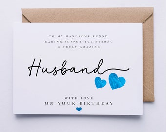 May include: A white card with blue hearts and the text "To my handsome, funny, caring, supportive, strong & truly amazing Husband. With love, on your birthday."