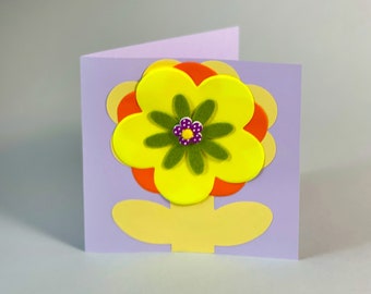 Unique, luxury, hand made blank greetings card with colourful cut out paper flower.