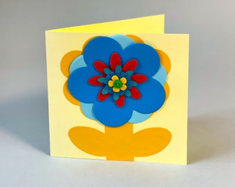 Unique, luxury, hand made blank greetings card with colourful cut out paper flower.