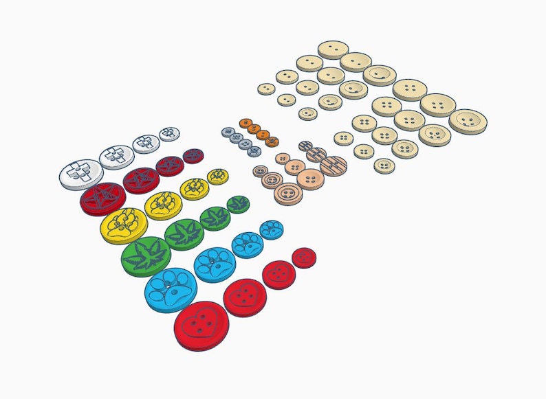Puede incluir: Un surtido de botones coloridos en varios tama&ntilde;os y dise&ntilde;os. Los botones incluyen colores lisos como el rojo, el azul y el amarillo, as&iacute; como botones con dise&ntilde;os florales y de hojas. Algunos botones tienen cuatro agujeros, otros dos.