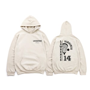 a white hoodie with a black and white graphic on it