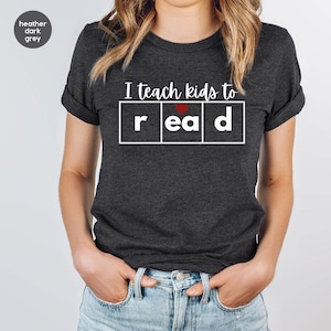 Funny Teacher Shirt, Reading Teacher Gift, Teacher Appreciation Graphic Tees, Gift for Teacher, Teacher Vneck TShirt, I Teach Kids To Read