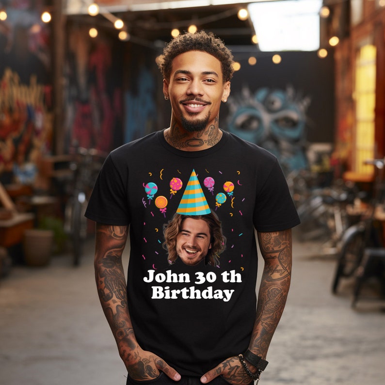 a man wearing a birthday shirt with a photo on it