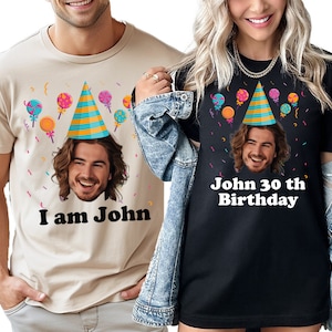 a man and a woman wearing matching birthday shirts