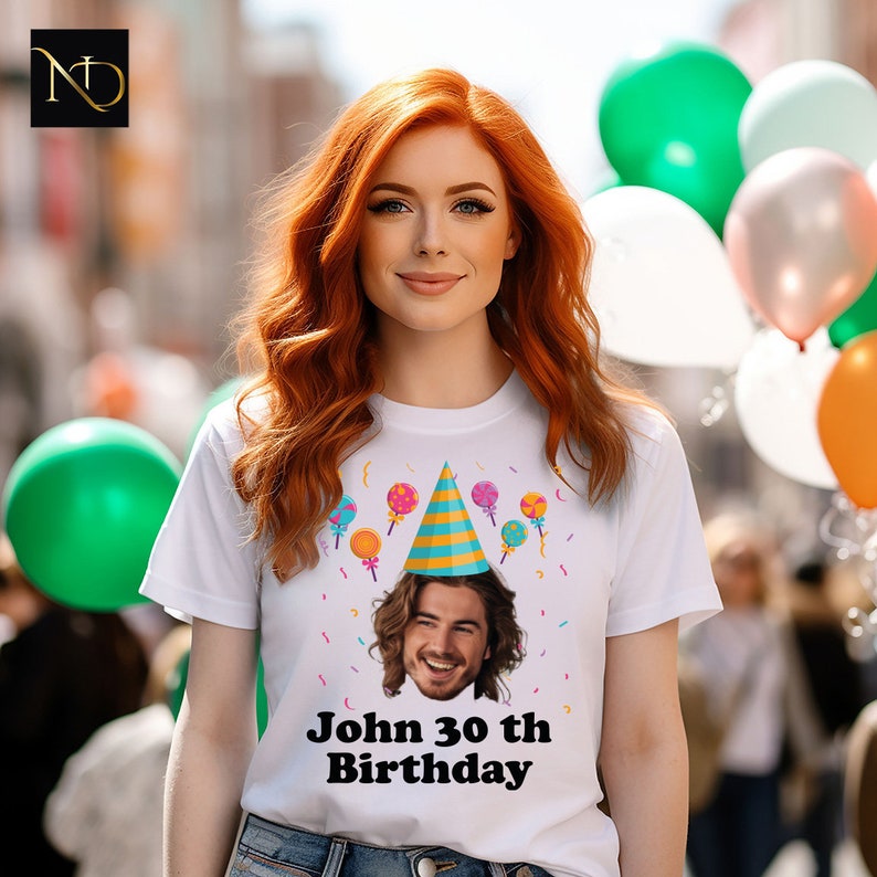 a woman with red hair wearing a birthday t - shirt
