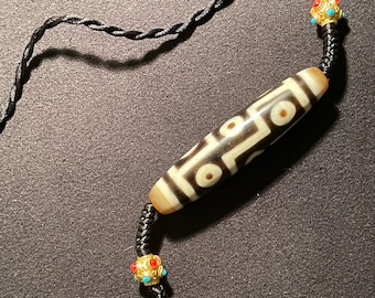 Buy Tibetan Nine-eyed Dzi Bead 九眼天珠 Online in India - Etsy