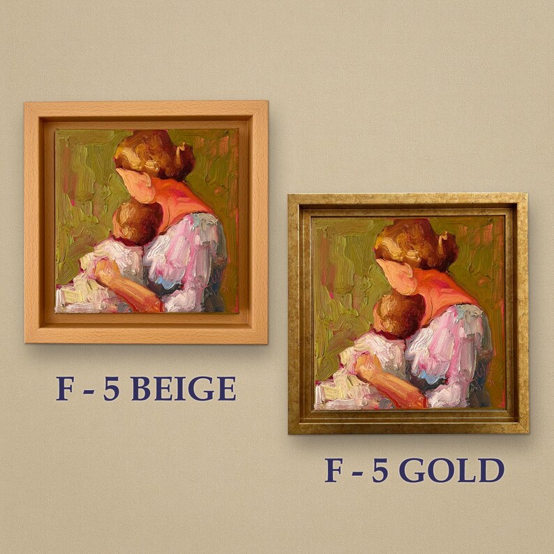 May include: Two framed oil paintings depict a mother and child in an embrace. One frame is light beige, the other gold. The artwork features a palette of greens, pinks, and oranges. The text "F-5 BEIGE" and "F-5 GOLD" are below the frames.