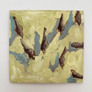 May include: Abstract oil painting on canvas. The artwork features a textured background in shades of yellow-green, with dark brown and blue-gray shapes. The brushstrokes are visible, creating a dynamic and expressive composition.