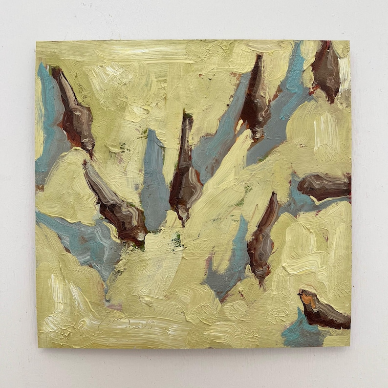 May include: An abstract oil painting on canvas. The artwork features a textured background in shades of yellow and green. Dark brown and blue shapes are painted throughout the canvas, creating a sense of depth and movement. The brushstrokes are visible, adding to the artwork's tactile quality.