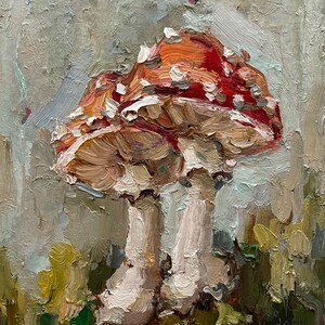 May include: An oil painting featuring two mushrooms with thick, textured brushstrokes. The caps are a vibrant red with white spots, while the stems are a pale cream color. The background consists of muted gray and green tones with visible paint texture.