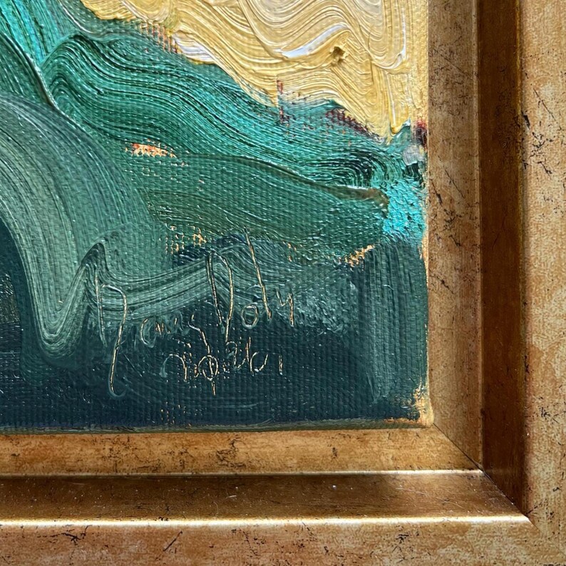 May include: An abstract oil painting with a gold-colored frame. The artwork features textured brushstrokes in shades of green, gold, and white. The artist's signature is visible in the lower portion of the painting.