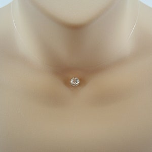 Single Crystal Floating Illusion Necklace, Clear 8mm Crystal in a Silver or Gold plated casing on transparent almost invisible cord