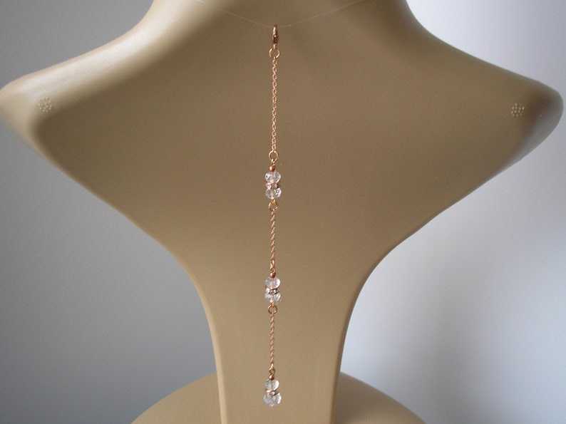 Gorgeous crystal and diamante clip-on backdrop attachment for a necklace
Handmade to order using 6 and 8mm rondelle crystals with 6mm crystal diamante on fine silver or gold plated curb or rose gold plated cable chain